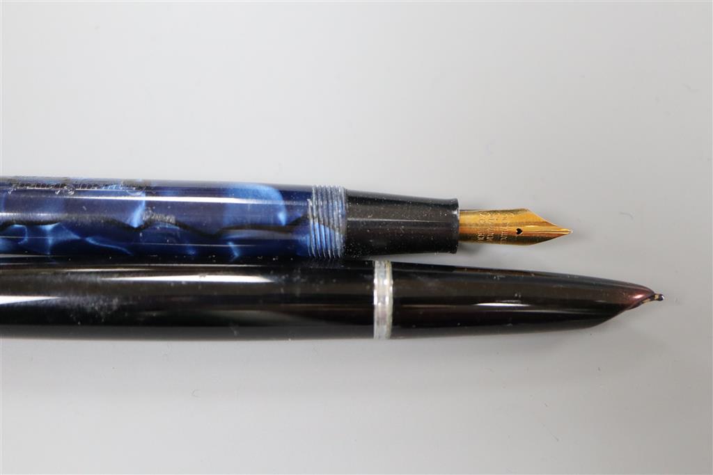 A boxed Conway Stewart blue marbled fountain pen and a Parker 51